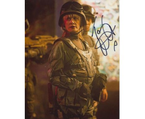 TAMZIN OUTHWAITE: 8x10 inch photo from Doctor Who "Nightmare in Silver" signed by Tamzin Outhwaite. Good condition 