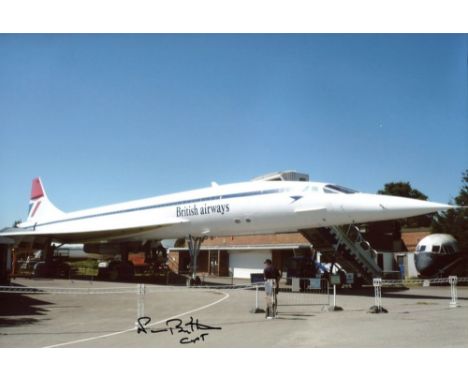 CONCORDE WORLD RECORD: 8x12 inch photo, a view of Concorde standing at rest, signed by Concorde pilot Neil Britton who, on th