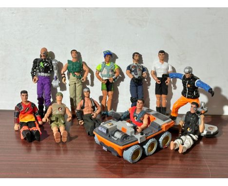 A collection of Action Man figures.