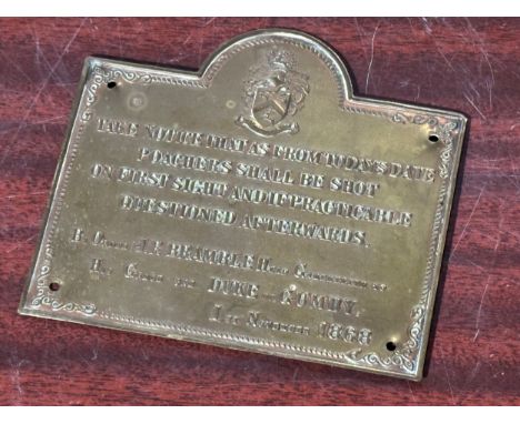 A vintage brass sign. Take notice that as from today’s date poachers shall be shot on first sight and if practicable question