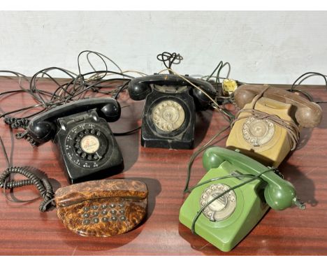 5 vintage telephones.