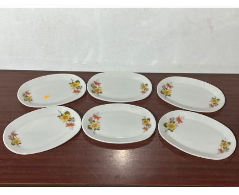 A set of 6 vintage JAJ Pyrex platters. 30.5x23cm
