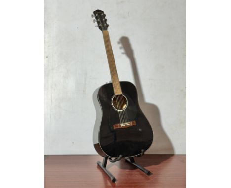 A Fender guitar and stand. Model CD-60S/BLK.