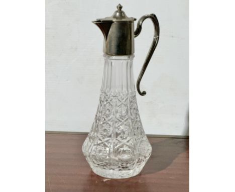 A vintage silver plated claret jug. 30cm