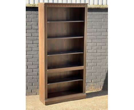 A large Ercol open bookcase/shelving unit. 93x34.5x196.5cm