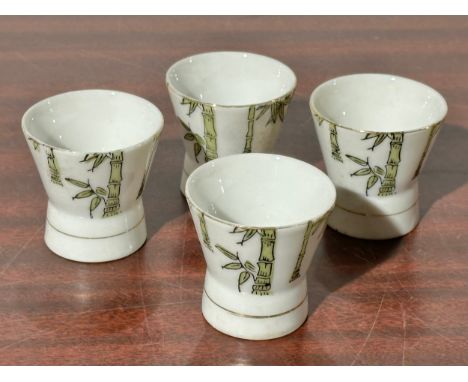 A set of 4 vintage Japanese sake cups with erotic images.