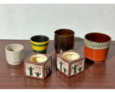A quantity of ceramic planters.