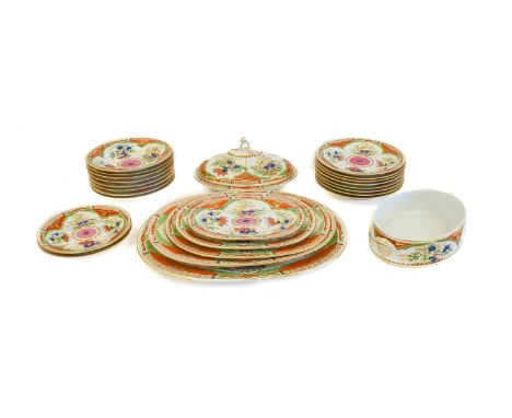 A Chamberlains Worcester Porcelain Dinner Service, circa 1810, painted in bright enamels with the Dragon in Compartments patt