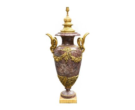 A Gilt Metal Mounted Breche Violette Marble Lamp Base, in Louis XVI style, of urn shape with entwined serpent handles hang wi