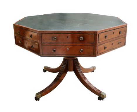A Regency Mahogany and Ebony-Strung Octagonal Library Table, early 19th century, with an inset green leather writing surface 