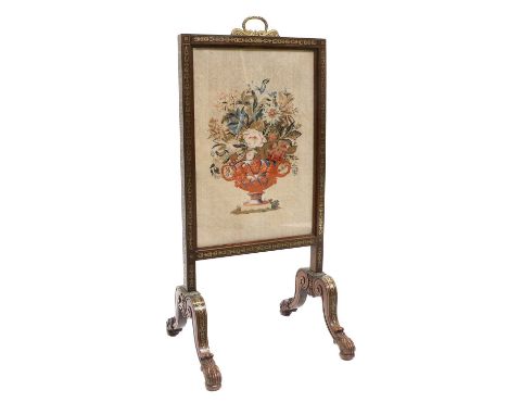 A Regency Rosewood and Brass-Inlaid Firescreen, in the manner of Gillows, circa 1820, with a retractable floral needlework pa