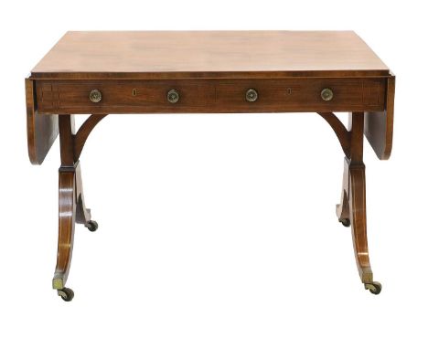 A Regency Mahogany, Rosewood-Crossbanded, Boxwood and Ebony-Strung Sofa Table, early 19th century, with rounded drop leaves t