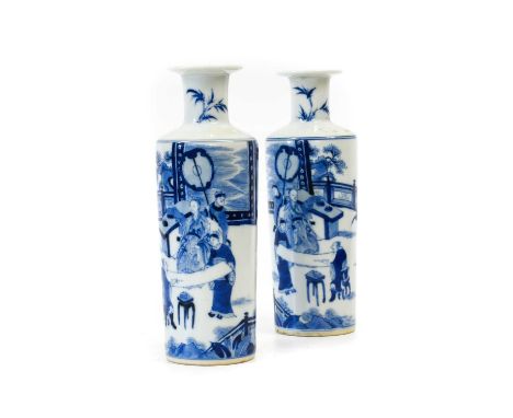 A Pair of Chinese Porcelain Small Rouleau Vases, Kangxi, of cylindrical form with flared neck, painted in underglaze blue wit