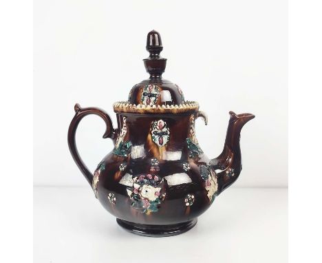 A LARGE, ANTIQUE, LATE 19TH CENTURY MEASHAM BARGEWARE TEAPOT, 40cm H x 40cm. Treacle-glaze and hand-applied, glazed details. 