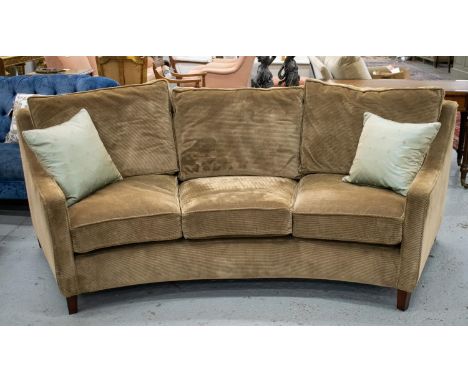 CONCAVE SOFA, brown corduroy with two green scatter cushions, 93cm H x 248cm W x 93cm D.