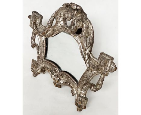 TOILET MIRROR, 18th century Italian silvered and carved wood, rectangular with scroll frame and easel support, 47cm H x 58cm 