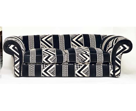 SOFA, black and cream wool worsted with geometric and chevron motifs and broad scroll arms, L: 265cm, H: 77cm, D: 108cm. Rais