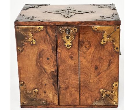 HUMIDOR/CIGAR CABINET, 19th century burr walnut and gilt metal mounted with two doors, enclosing three drawers with moveable 