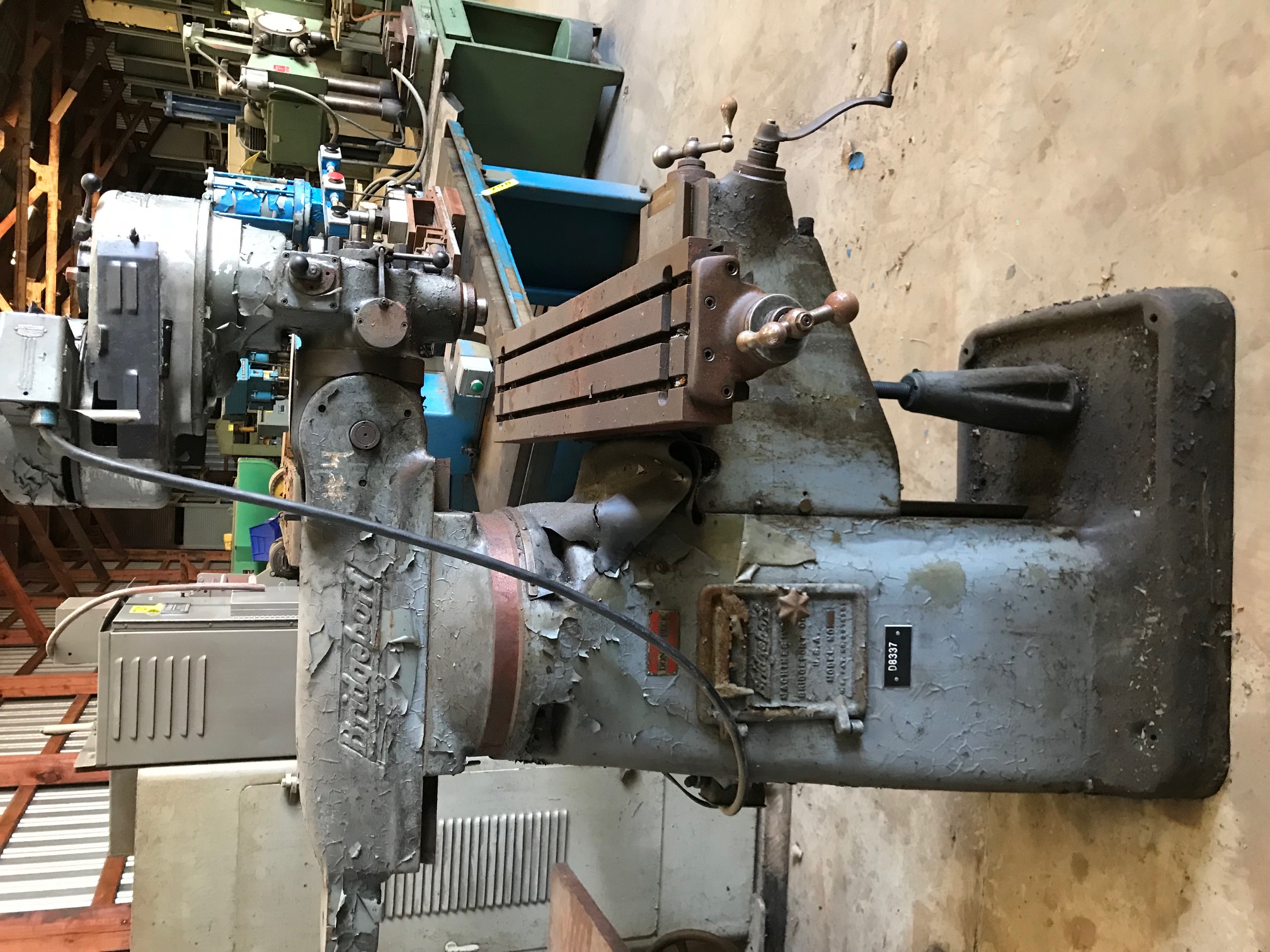 BRIDGEPORT 1 HP “J-HEAD” RAM TYPE VERTICAL MILL, S/N BR29940Loading Fee ...