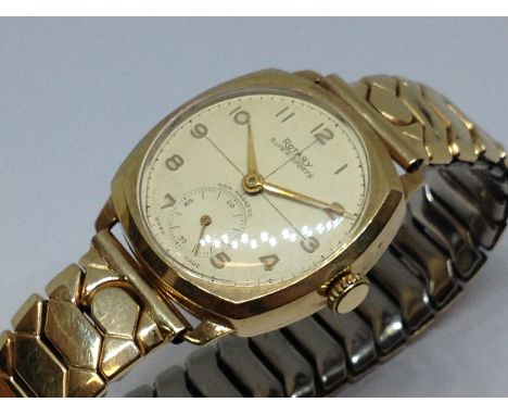 A 9ct gol Rotary Super-Sports wristwatch with gold plated flexi strap.  