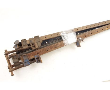 A pair of heavy duty sash cramps (lacks handles) and three other sash cramps G 