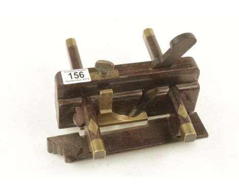 An unusual rosewood sash fillester with brass depth stop, added steel sole G 