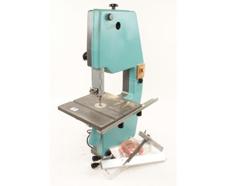 An INCA band saw. PAT tested G 