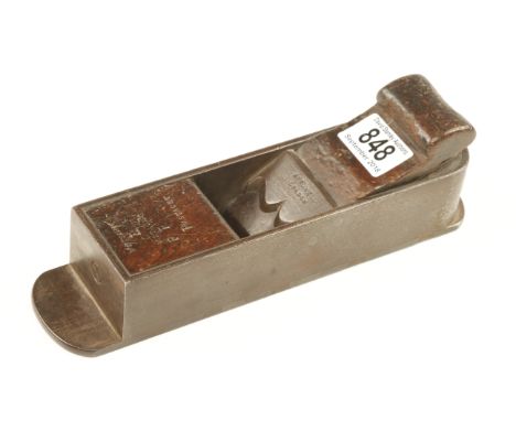 A d/t steel mitre plane by Rt. TOWELL 10" x 2 1/2" with rosewood infill and wedge behind cupids bow bar, some wedge bruising 