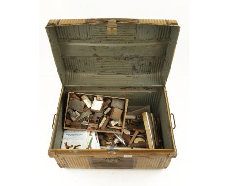 A metal trunk with a few tools G 