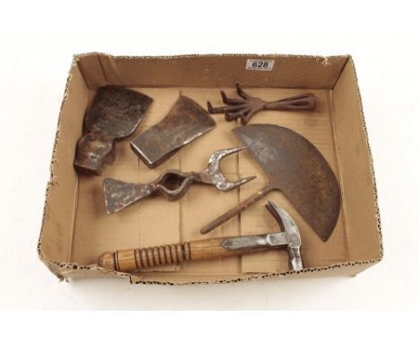 Two axe heads , a hammer and three garden tools lacking handles G 