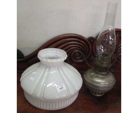 Single oil lamp with opaline glass fluted shade and chimney.(B.P. 24% incl. VAT)