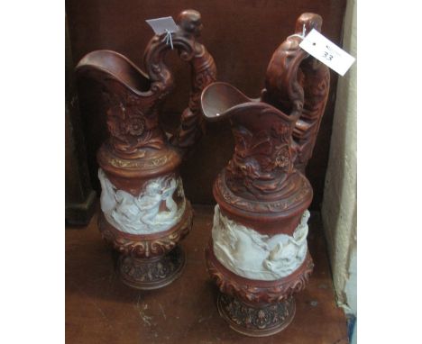 Pair of leaf decorated classical style ceramic ewers. 51cm approx. (2)(B.P. 24% incl. VAT) 