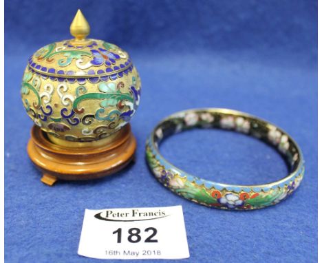Cloisonne enamel floral decorated bangle with inner and outer decoration on pale blue and black ground. Together with a moder
