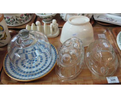 Two vintage glass jelly moulds, together with a ceramic jelly mould, Lurpak novelty toast rack etc. (B.P. 24% incl. VAT)