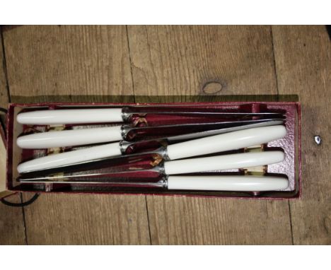 A Victorian cased set of silver plated chinoiserie fish servers, by Atkin Brothers; together with a cased bread knife and for