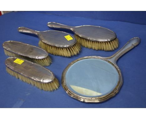 An engine turned silver five piece brush set, by W.A, Birmingham 1922/23.