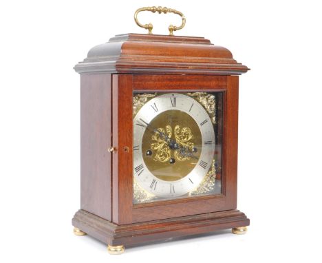 Comitti - Franz Hermle - A large 20th century oak cased Comitti bracket clock. The clock having gilt face with incised rocail