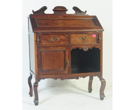 An Edwardian&nbsp;Chinese Chippendale manner mahogany ladies writing bureau desk. The desk having fall front door to top with