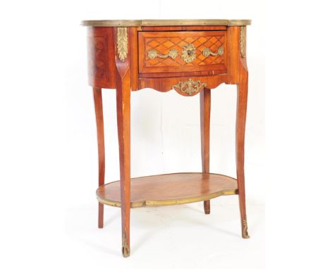 A 19th century Louis XVI style marquetry and ormolu occasional table / lamp stand. Of kidney form with marble top fitted into