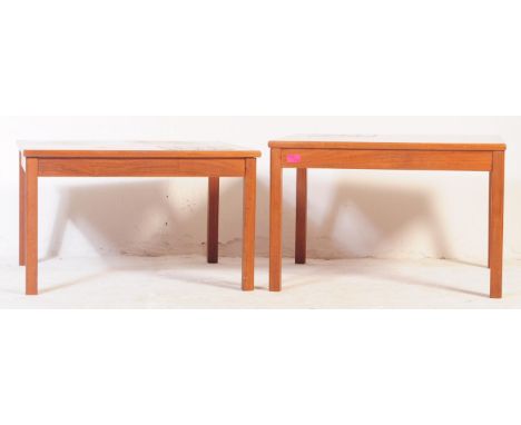 A matching pair of retro 20th century danish inspired teak occasional coffee tables. Of rectangular form, both having a squar