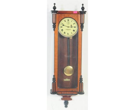 A contemporary 19th century revival Lauren 8 day large Vienna regulator wall clock. The large decorative walnut case with gla