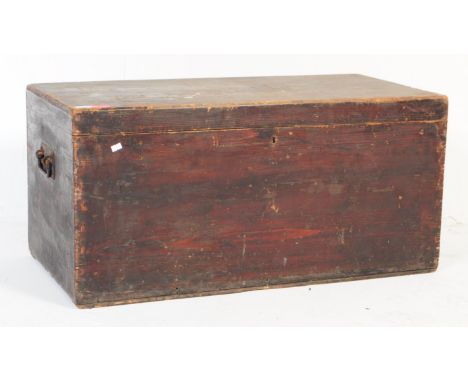 A 19th century painted pine blanket box / trunk. The chest being of low rectangular form. Measures approx 43cm x 88cm x 44cm.
