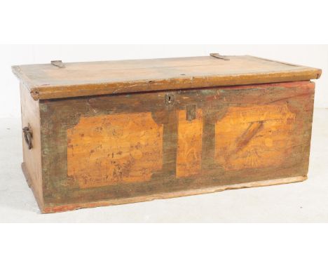 A 19th Century Dutch painted pine trunk blanket box chest. Wrought iron strapwork throughout with hand painted decoration to 