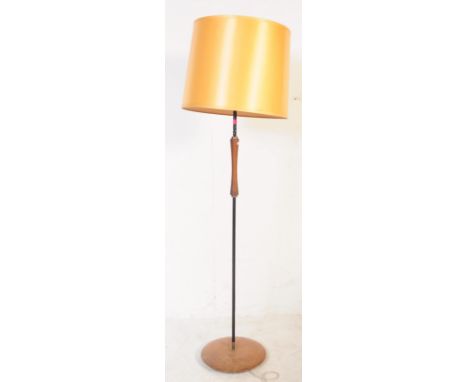 Mid-century Danish manner teak wood and metal standard floor lamp raised on terraced base with upright teak wood centre stem,