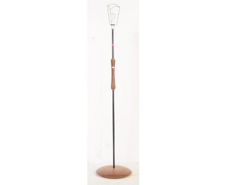 Mid-century Danish manner teak wood and metal standard floor lamp raised on terraced base with upright teak wood centre stem,