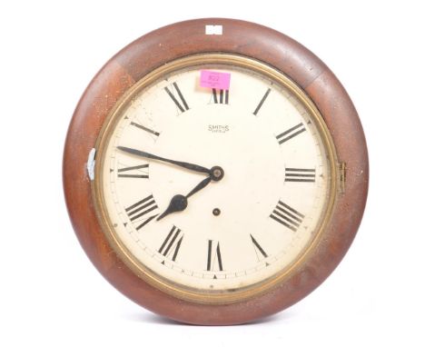 Smiths Enfield - An Edwardian circa 1900s mahogany cased Railway Station wall clock. The clock having white face with enamell