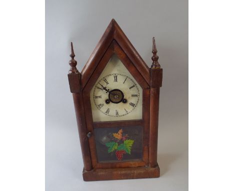 An Architectural American Mantle Clock with Alarm Movement and Vine and Grape Decoration to Pendulum Door.  