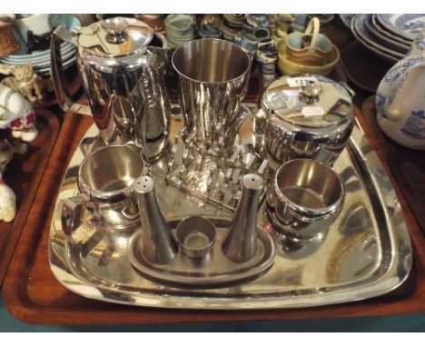 A Collection of Old Hall Stainless Steel Tea and Dinner Wares to Include Tea Service Tray Toast Rack Cruet Tankard Etc. 