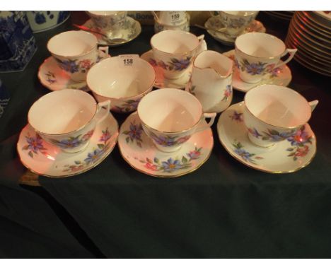 A Part Melba Pattern Tea Set to Comprise Six Cups and Saucers Sugar Bowl and Cream Jug.