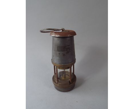 A Brass Mounted Miners Lamp, The Wolf Safety Lamp Company (William Maurice) Limited. 